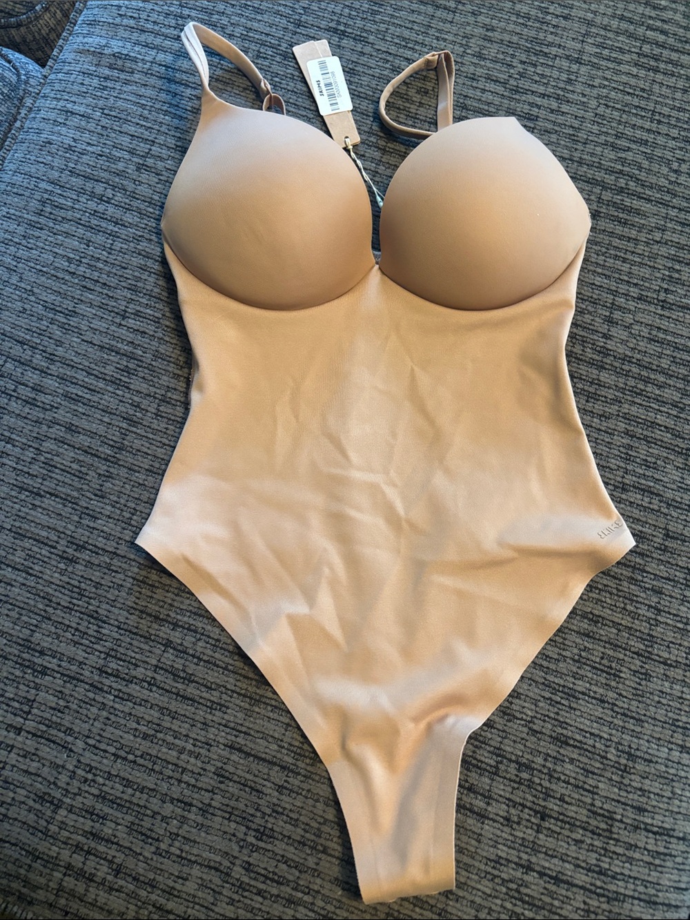 Skims ultimate pus-up thong body suit. *Stain* see photo $144 value